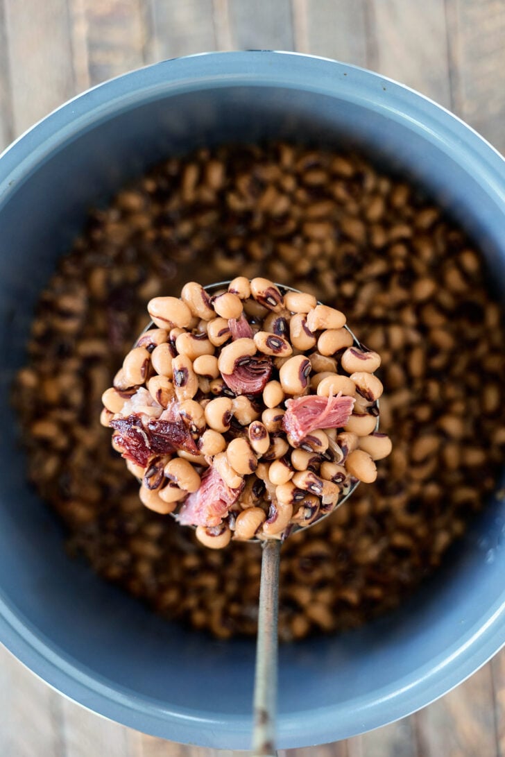 Scoop of Slow Cooker Black-Eyed Peas.