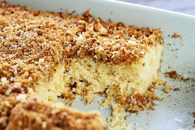 Pineapple Cake with Coconut Topping with slices missing