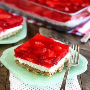 Servings of Strawberry Pretzel Salad on green serving dishes
