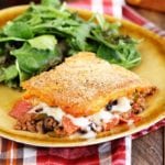 Upside Down Pizza Casserole being served with salad