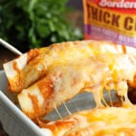 These quick and easy enchiladas only call for 5 ingredients and are ready in no time! It's the perfect recipe for a busy weeknight! #recipe #southernbite #enchiladas #easy #quick #weeknight