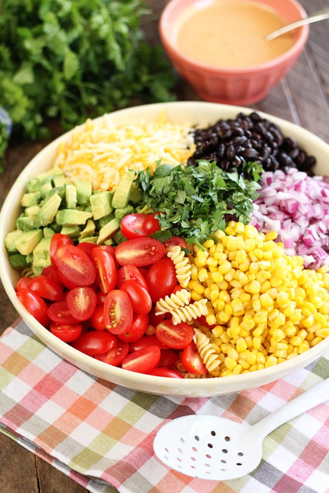 Taco Pasta Salad ingredients before mixed with dressing on the side