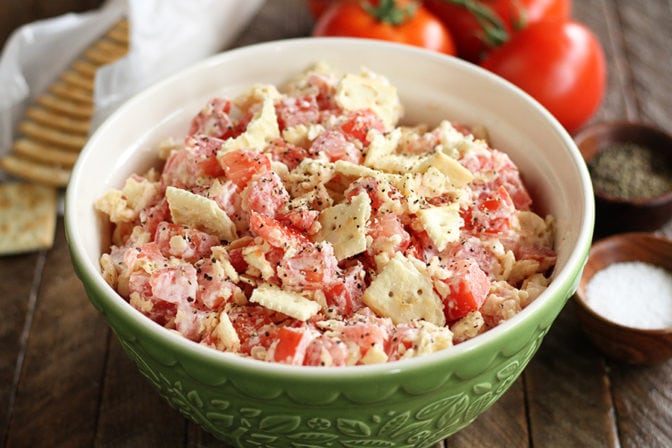 Tomato and Cracker Salad with fresh tomatoes in background