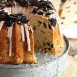 Oreo Pound Cake on serving platter with slice missing