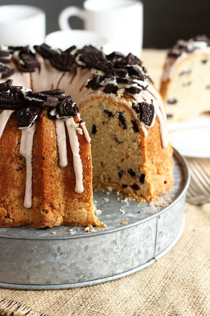 Oreo Pound Cake on serving platter with slice missing