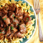 Close Photo of Slow Cooker Beef served over noodles
