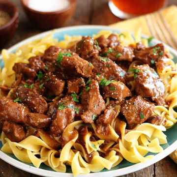 Slow Cooker Beef served over noodles