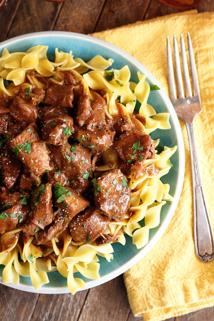 Close Photo of Slow Cooker Beef served over noodles