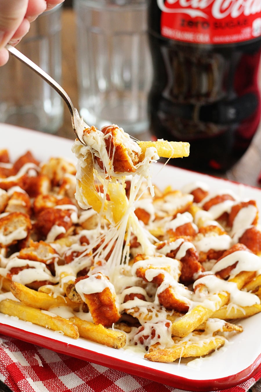Close photo of Buffalo Chicken Fries being served with fork