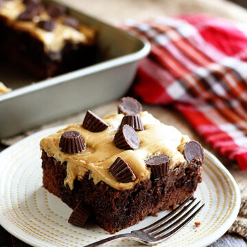 Piece of Chocolate Peanut Butter Poke Cake on plate.