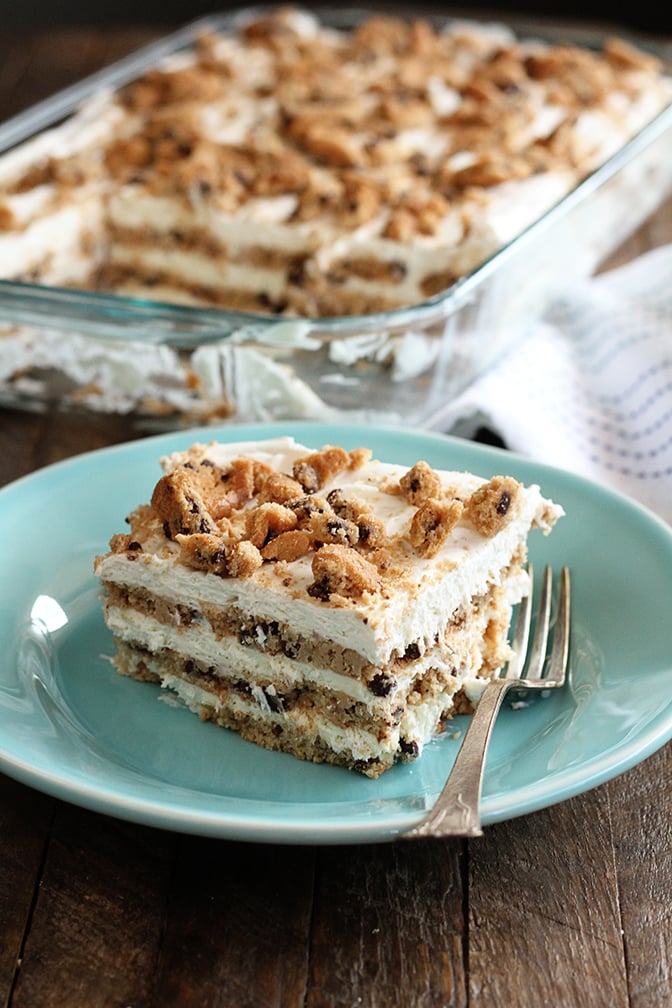 Slice of Milk and Cookies Icebox cake on green dish