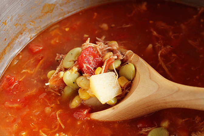 Shortcut BBQ Stew being served with large spoon