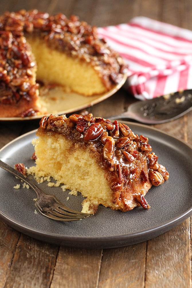 Caramel Pecan Upside Down Cake showing sliced piece