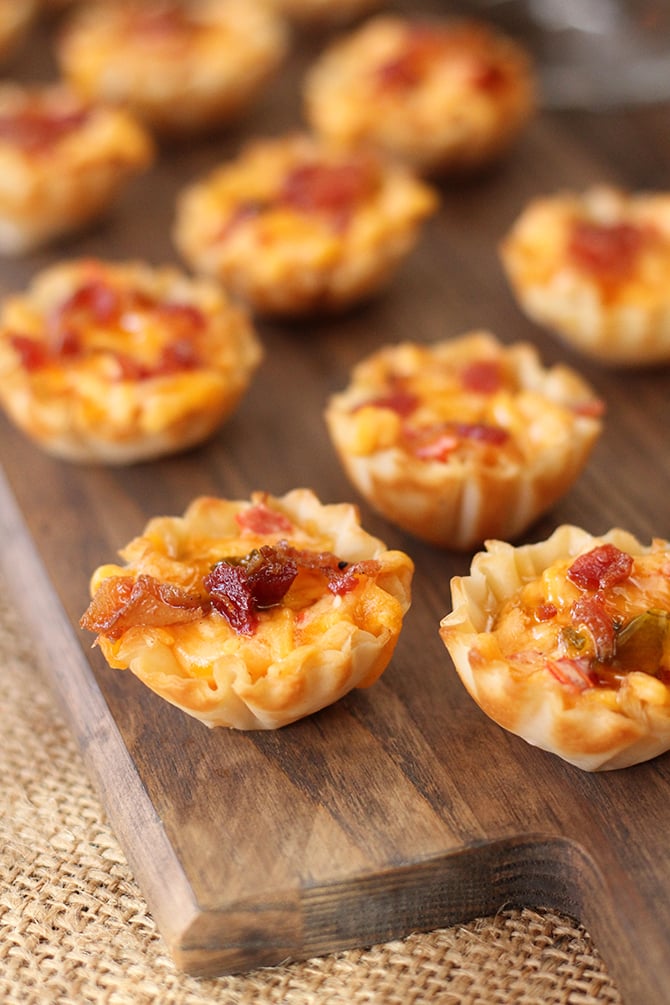 Close up photo of Pimento Cheese Bites on wooden serving board