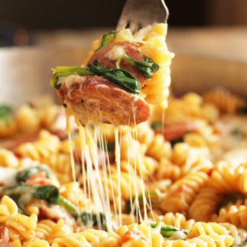 Simple One Pan Sausage Pasta being served with fork