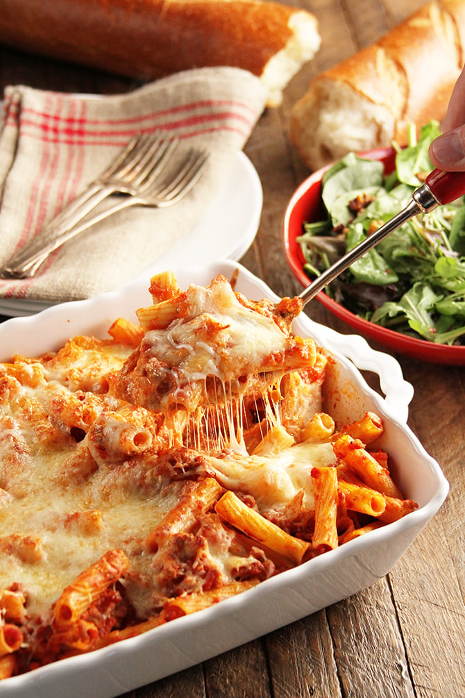 Cheesy Bakes Ziti being served