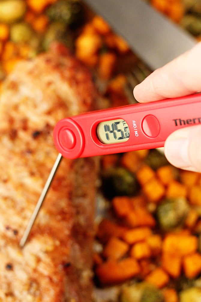 Checking Sheet Pan Brown Sugar Garlic Pork Loin temperature