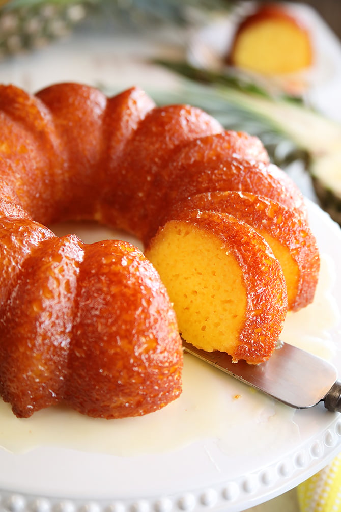 Pineapple Juice Cake while serving a slice close photo