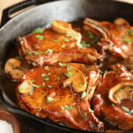 Skillet Chops with French Onion Gravy in cast iron skillet