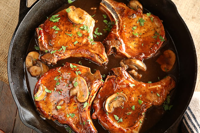Skillet Chops with French Onion Gravy with mushrooms on top