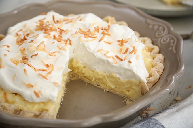 Coconut Cream Pie with slice missing