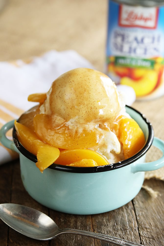 Brown Sugar peach Sauce served with ice ream and peaches close photo