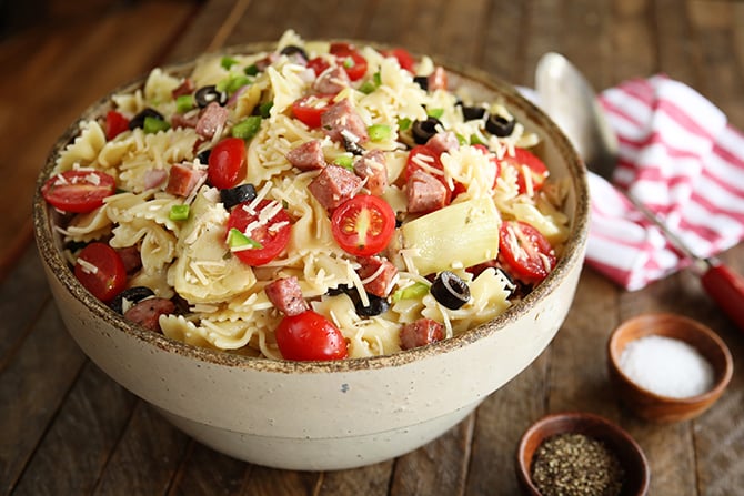 Kitchen Sink Pasta Salad with salt and pepper in background