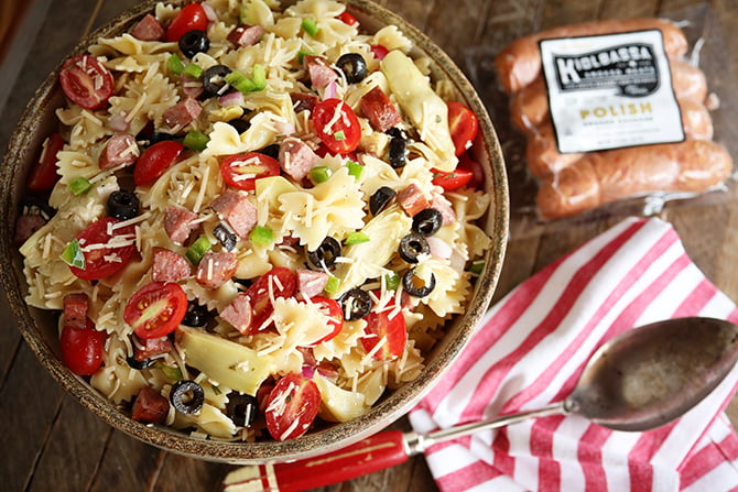 Kitchen Sink Pasta Salad with package of sausage in background