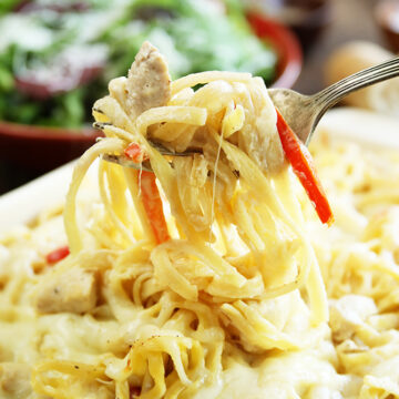 Ultimate Baked Alfredo close up photo on fork