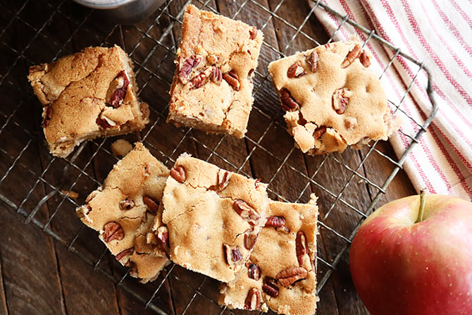 Apple Pecan Chewies on cooling rack with apple