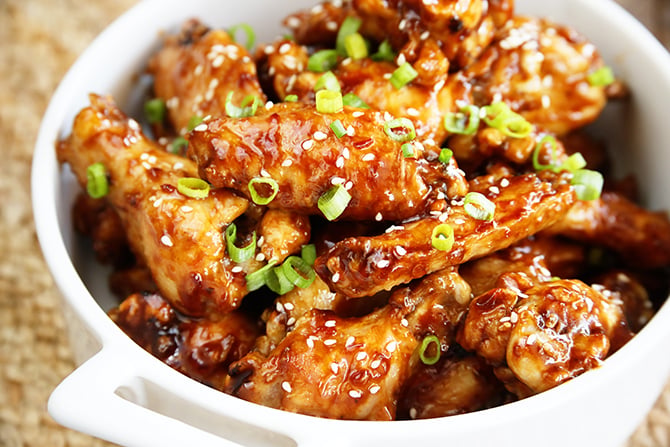 Asian Sticky Wings in white serving bowl