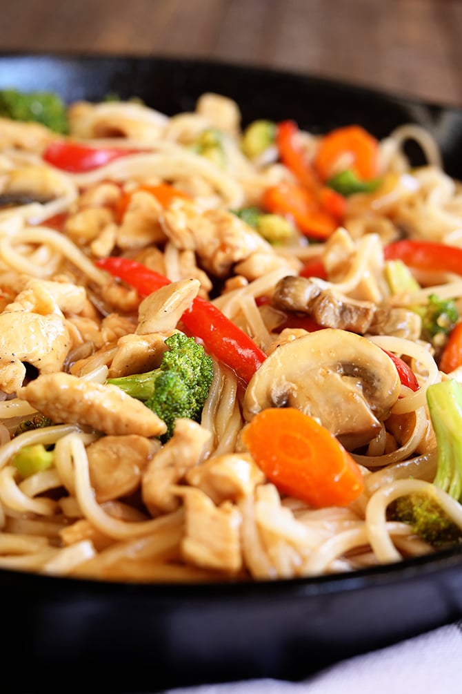 Easy Chicken Noodle Stir Fry served in cast iron skillet