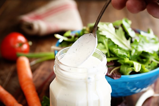 Best Ranch Dressing being dipped from jar