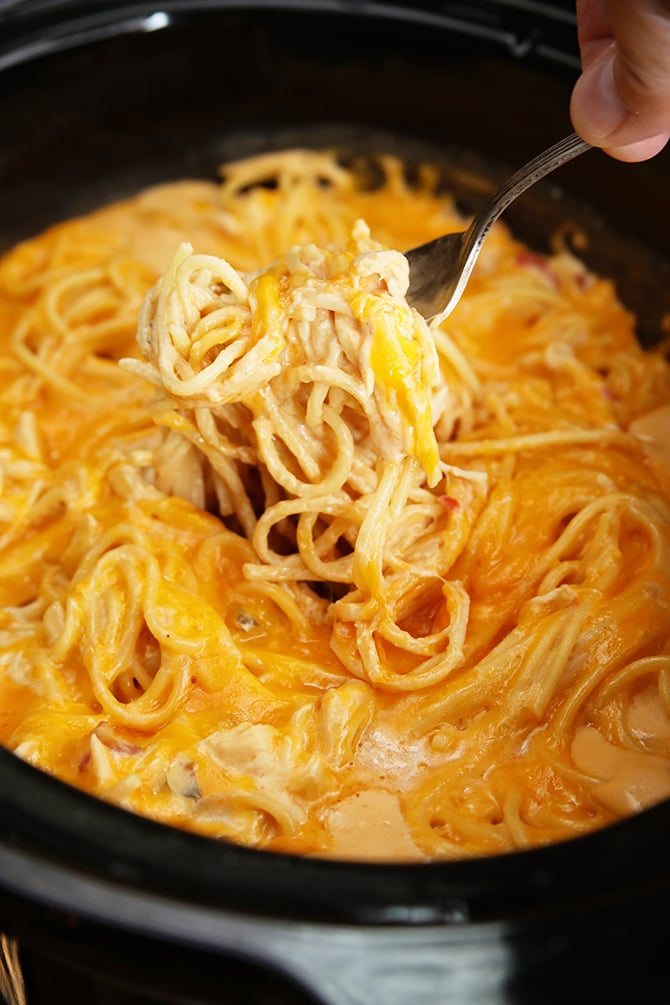 Crock Pot Chicken Spaghetti being served with fork