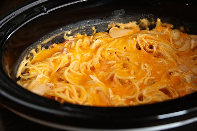 Crock Pot Chicken Spaghetti in black crock pot dish