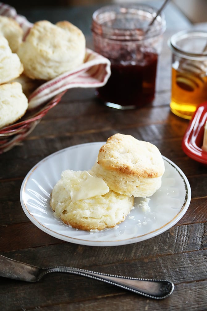 Easy Buttermilk Biscuits sliced with butter on top