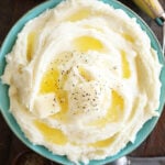 Top view of Mashed Potatoes with butter and black pepper