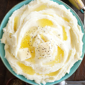 Top view of Mashed Potatoes with butter and black pepper