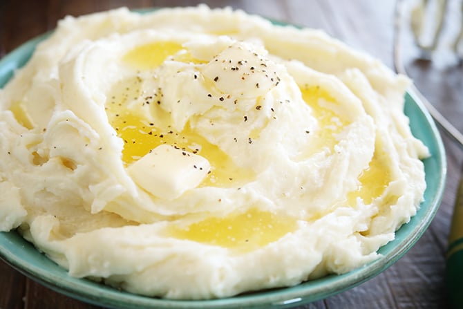Mashed Potatoes topped with butter and black pepper