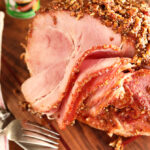 Baked ham with toppings sliced