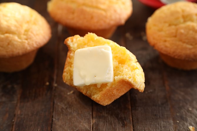 Jazzed Up Jiffy Cornbread muffins with butter