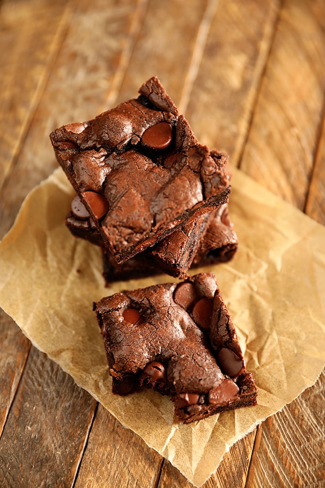 Squares of brownies on parchment paper
