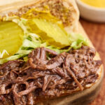 Slow Cooker Roast Beef Debris Po Boy.