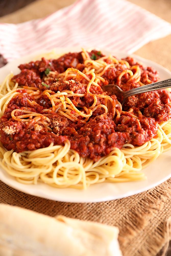 Cooked pasta with Slow Cooker Spaghetti sauce on top
