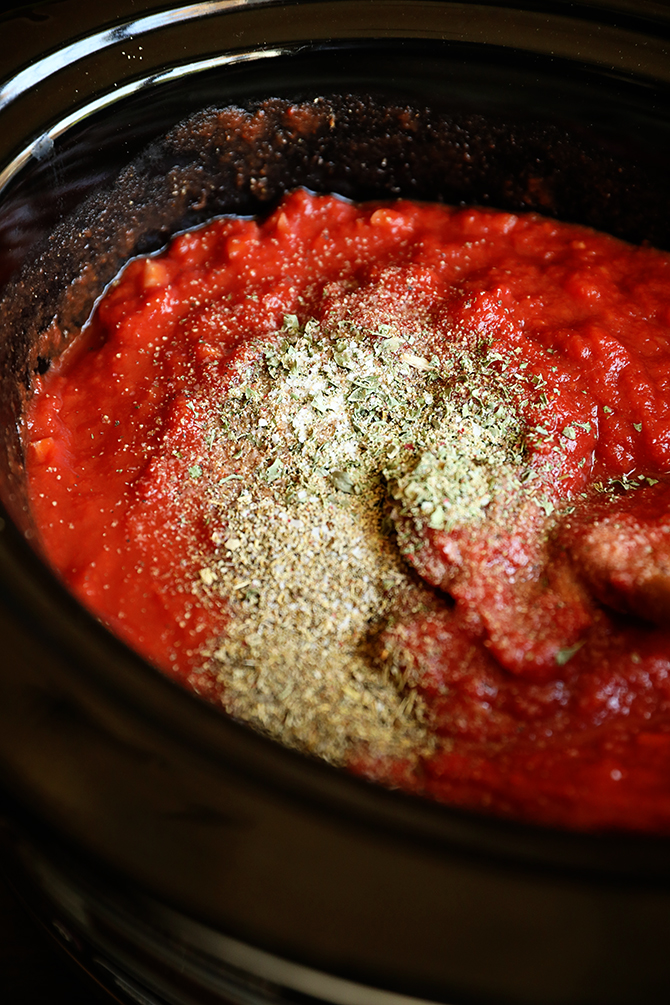 Ingredients for Slow Cooker Spaghetti Sauce in crock pot before stirring