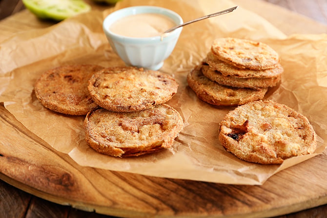 Fried green tomatoes on brown paper with remoulade sauce