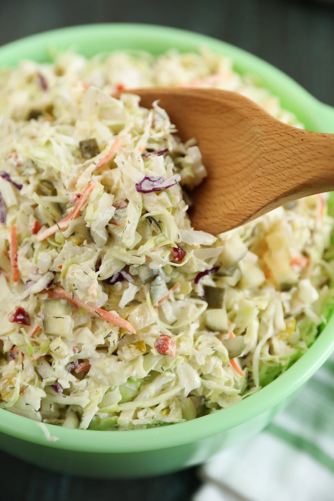 Dill Pickle Coleslaw with wooden spoon