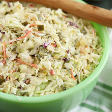 Dill Pickle Coleslaw in a green bowl