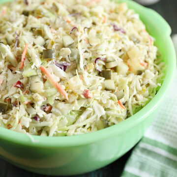 Dill Pickle Coleslaw in a green bowl