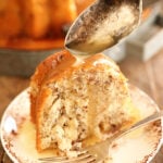 Bama Butter Cake with Butter Sauce Being Spooned over the top